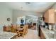 Open kitchen with a view of the dining area and Gathering room at 28829 N Broken Shale Dr, San Tan Valley, AZ 85143