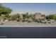 Xeriscaped front yard with stucco home and moon visible at 24005 N 45Th Dr, Glendale, AZ 85310