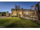 View of backyard, pool, and home at night at 24005 N 45Th Dr, Glendale, AZ 85310