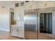 Modern kitchen features stainless steel appliances and white shaker cabinets at 24005 N 45Th Dr, Glendale, AZ 85310