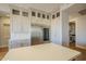 Modern kitchen with stainless steel refrigerator and white cabinets at 24005 N 45Th Dr, Glendale, AZ 85310
