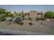 Xeriscaped front yard with stucco home, moon visible at 24005 N 45Th Dr, Glendale, AZ 85310