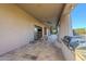 Covered patio with built-in grill and access to the living room at 24005 N 45Th Dr, Glendale, AZ 85310