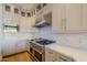 Kitchen features stainless steel appliances and white shaker cabinets at 24005 N 45Th Dr, Glendale, AZ 85310