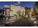Night view of Southwestern style home with desert landscaping at 24005 N 45Th Dr, Glendale, AZ 85310