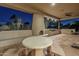 Outdoor patio with built-in BBQ, fireplace, and seating area at 24005 N 45Th Dr, Glendale, AZ 85310