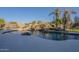 Inviting pool with waterfall and slide feature at 24005 N 45Th Dr, Glendale, AZ 85310