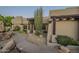 Front entrance with curved walkway and desert landscaping at 24005 N 45Th Dr, Glendale, AZ 85310