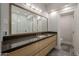 Modern bathroom with a large vanity and mirror at 24005 N 45Th Dr, Glendale, AZ 85310