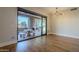 Breakfast nook with sliding doors leading to a patio with fireplace at 24005 N 45Th Dr, Glendale, AZ 85310