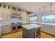 Modern kitchen with stainless steel appliances and a large island at 24005 N 45Th Dr, Glendale, AZ 85310