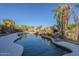 Relaxing kidney-shaped pool with a rock waterfall feature at 24005 N 45Th Dr, Glendale, AZ 85310