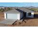 Single story home with a two car garage and mountain views at 58Xx N Nigal Rd, Casa Grande, AZ 85194
