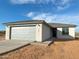 New single-story home with a two-car garage at 58Xx N Nigal Rd, Casa Grande, AZ 85194