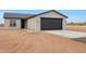New single-story home with a two-car garage at 58Xx N Nigal Rd, Casa Grande, AZ 85194