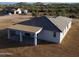 Single story home with covered patio and large backyard at 58Xx N Nigal Rd, Casa Grande, AZ 85194
