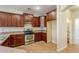 Kitchen with stainless steel appliances and ample wood cabinetry at 3795 E Latham Ct, Gilbert, AZ 85297