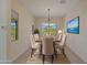 Bright dining room featuring a chandelier and large windows at 16375 S 180Th Dr, Goodyear, AZ 85338