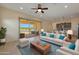 Open living room with sliding doors leading to a patio at 16375 S 180Th Dr, Goodyear, AZ 85338