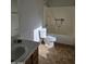 Clean bathroom with a shower/tub combo and tile floors at 5020 S 25Th Ave, Phoenix, AZ 85041