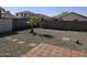 Spacious backyard with gravel and a patio area at 5020 S 25Th Ave, Phoenix, AZ 85041