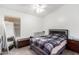 Bedroom with double bed, full-length mirror, and window at 10312 N 58Th Ln, Glendale, AZ 85302