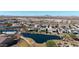 Community overview featuring a lake and numerous homes at 16375 S 180Th Dr, Goodyear, AZ 85338