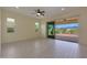 Living room with sliding doors opening to a scenic backyard at 16375 S 180Th Dr, Goodyear, AZ 85338