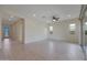 Spacious living room featuring tile floors and a ceiling fan at 16375 S 180Th Dr, Goodyear, AZ 85338