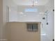 Large walk-in shower with glass enclosure and window at 16375 S 180Th Dr, Goodyear, AZ 85338