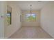 Bright dining room with large windows and a chandelier at 16375 S 180Th Dr, Goodyear, AZ 85338