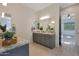 Elegant bathroom with granite countertops, gray cabinets, and a walk-in shower at 16375 S 180Th Dr, Goodyear, AZ 85338
