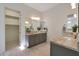 Bathroom with double vanity and granite countertop at 16375 S 180Th Dr, Goodyear, AZ 85338