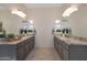 Spa-like bathroom with double vanity and granite countertops at 16375 S 180Th Dr, Goodyear, AZ 85338