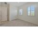 Bright bedroom with double doors and window shutters at 16375 S 180Th Dr, Goodyear, AZ 85338