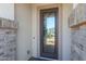 Modern front door with glass accents at 16375 S 180Th Dr, Goodyear, AZ 85338