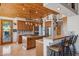 Gourmet kitchen boasts ample cabinetry, an island, and stainless steel appliances at 25210 N 90Th Way, Scottsdale, AZ 85255