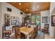 Elegant dining room with wood table and chairs, and access to the backyard at 25210 N 90Th Way, Scottsdale, AZ 85255