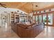 Spacious living area with a sectional sofa and access to the pool at 25210 N 90Th Way, Scottsdale, AZ 85255