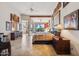 Spacious Primary suite with king-size bed and large window at 25210 N 90Th Way, Scottsdale, AZ 85255