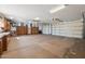 Large garage with ample storage and workbench at 25210 N 90Th Way, Scottsdale, AZ 85255
