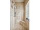 Large walk-in shower with built-in bench and glass block window at 25210 N 90Th Way, Scottsdale, AZ 85255