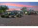 Luxury home with a circular driveway and landscaped front yard at 25210 N 90Th Way, Scottsdale, AZ 85255