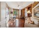 Home office with built-in shelves, desk, and seating area at 25210 N 90Th Way, Scottsdale, AZ 85255