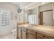 Well-lit bathroom with single vanity and toilet at 25210 N 90Th Way, Scottsdale, AZ 85255