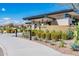 Modern clubhouse with stone exterior and landscaping at 10124 E Cintron Dr, Mesa, AZ 85212