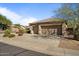 Two-car garage with extra storage cabinets at 41115 N Eagle Trl, Anthem, AZ 85086