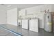 Bright laundry room with washer, dryer, and utility sink at 2164 S Catarina --, Mesa, AZ 85202