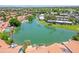 Aerial view of waterfront homes and a tranquil lake at 2164 S Catarina --, Mesa, AZ 85202