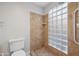 Bathroom with a walk-in shower and glass block window at 2164 S Catarina --, Mesa, AZ 85202